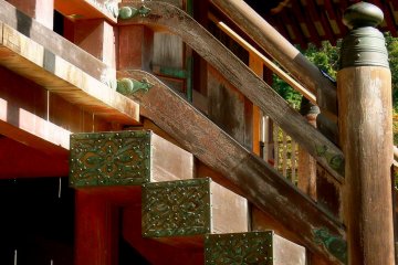 <p>Ornate metal plates protect the wood from invading insects</p>