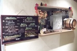 The wine menu and bar hatch