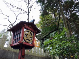 Red wooden lantern on the shrine grounds