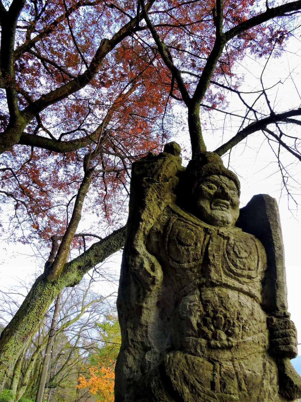 Statue of Fudo-Myo-O standing beside the Prayer Path in Nishiyama Park