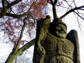 Statue of Fudo-Myo-O standing beside the Prayer Path in Nishiyama Park