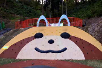 <p>Red panda-shaped playground equipment!</p>