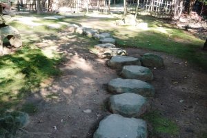 A stone path leads back to an old teahouse