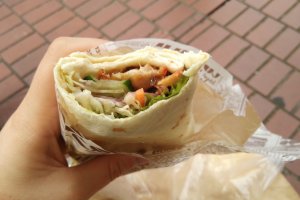 The kebab wrap, available to take out with a choice of sauce