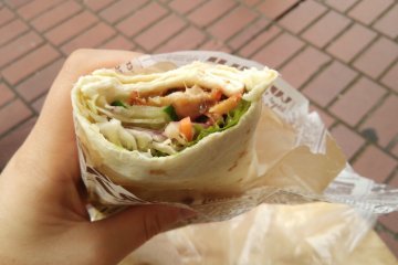 <p>The kebab wrap, available to take out with a choice of sauce</p>