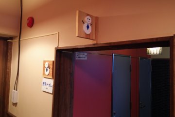 <p>A male snowman sign for the men&#39;s toilet</p>
