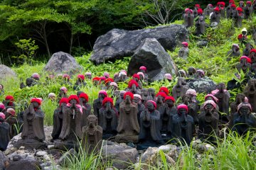 <p>Hundreds of Jizo statues flank the path leading to the Killing Stone.</p>