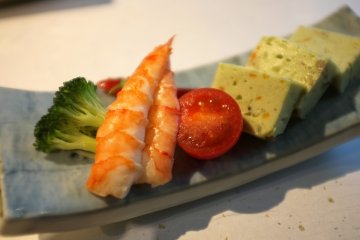 <p>Shrimp salad and kamaboko</p>