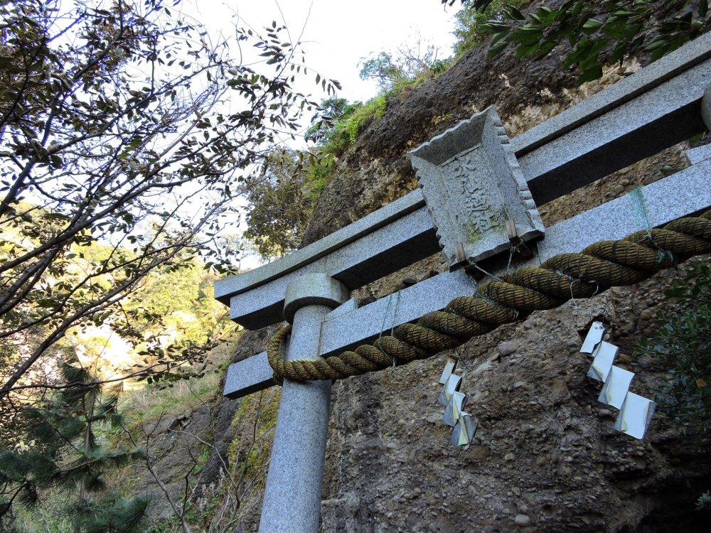 Torii gate of Daffodil Shrine at the foot of the rocky hill
