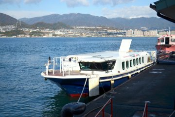 <p>Boat terminal of Miyajima entrance. There are a lot of larger ferry boats operating much more frequently, but taking a&nbsp;cruise on a boat is a lot of fun. This boat was from Hiroshima City, and takes&nbsp;45 minutes</p>