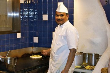 The chef who cooks and serves with a smile