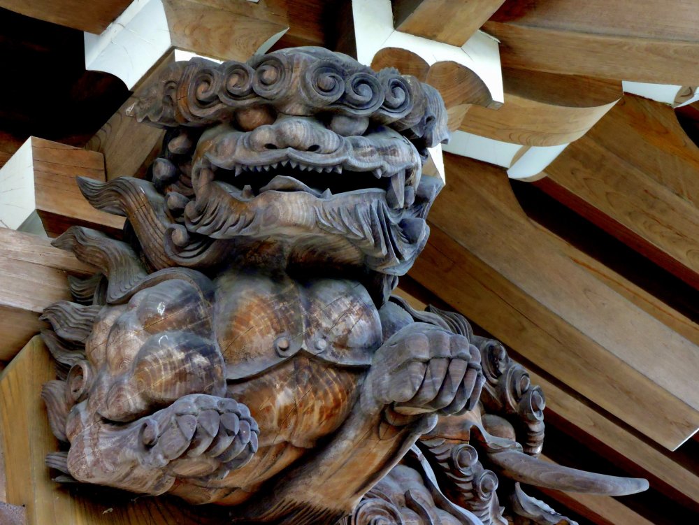 Carving of a shishi - a mythological creature with powers of protection