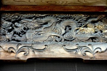 <p>Wood carving of a dragon</p>