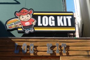 Log Kit&#39;s sign is easy to see as soon as you come off of the expressway