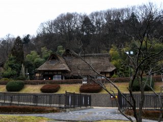 Thatched-roof houses of Osagoe Folk Museum on a rainy day in early March