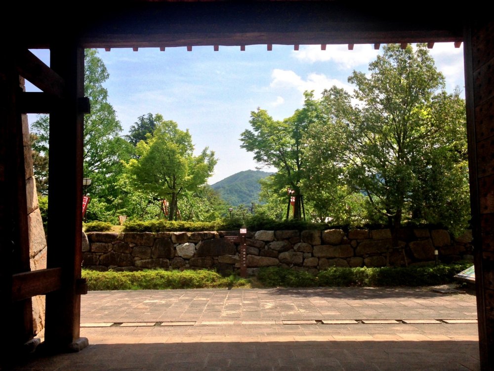 The burrowed view of the distant mountains from the Maizuru Park Gardens