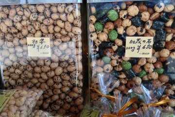 <p>The round bite sized rice crackers coated with seaweed and a soy sauce glaze, are given local names like &ldquo;Kamo river pebbles&rdquo;.&nbsp;</p>