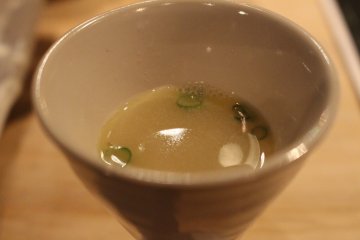 <p>A chicken broth to start the meal</p>