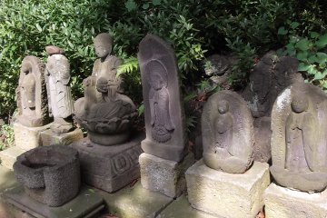 <p>Statues lined up by the path</p>