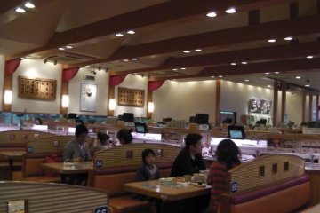 The typical interior of a kaiten-zushi&nbsp;restaurant - notice the conveyor-belt!