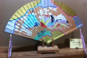 Fan with design from Tale of Genji. Fans for interior decoration have different displays on the front and back, to match the changing seasons