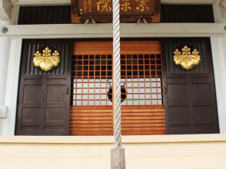 The front doors of the main temple building