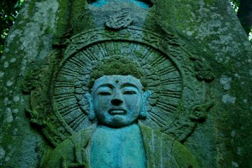 <p>Buddha carved on a monolith</p>