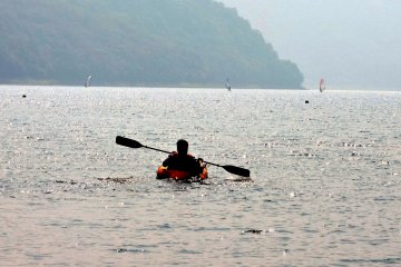 <p>There were windsurfers and paddle boarders on the lake too</p>