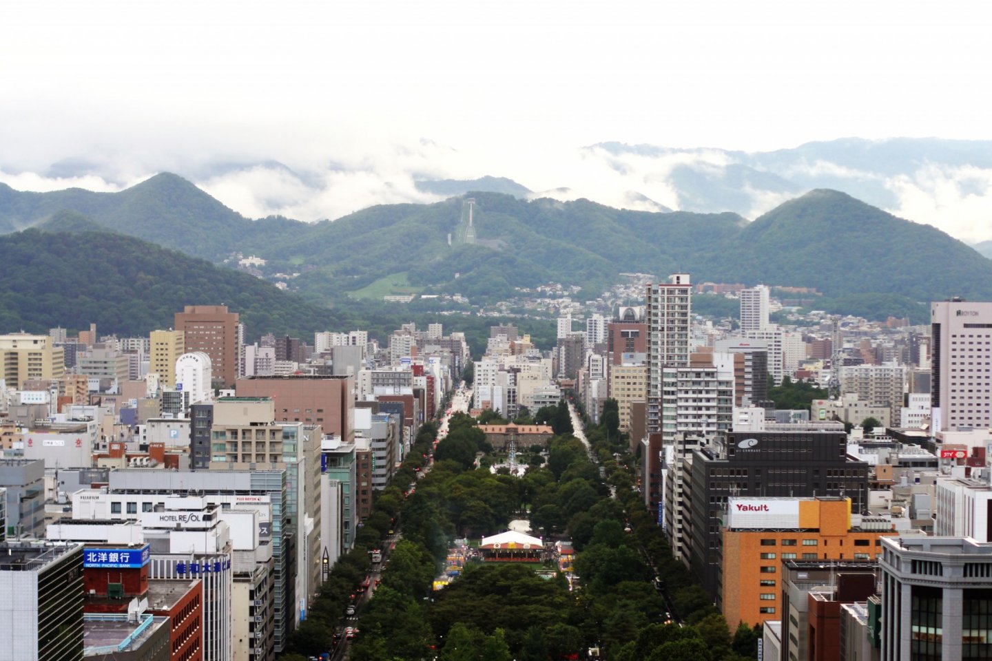 The huge Odori Park, cityscape and mountain in one frame picture are great.