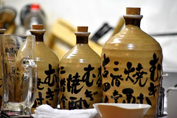 <p>Bottles of mugi shochu (barley shochu)</p>
