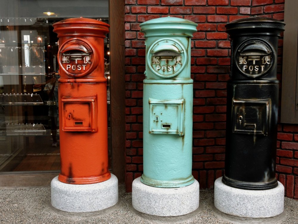 Old Japan post boxes in three colors