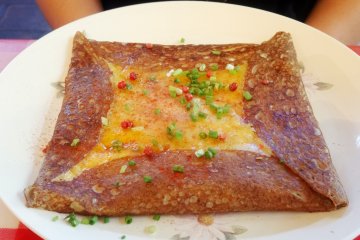 <p>A savory ham, egg and cheese galette</p>