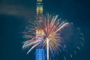 Colorful fireworks in front of the Tokyo Skytree