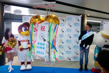 <p>A brief opening ceremony on the Tozai line Sendai Station platform</p>