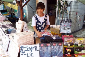 <p>Ms. Toshi at her sweets stand</p>
