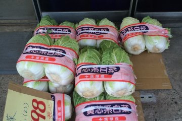 <p>Cabbage is sold at a local market.</p>
