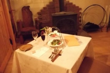 <p>My table, separated from the others but not enclosed</p>