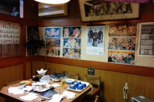 Tons of sumo pics and info decorate the interior