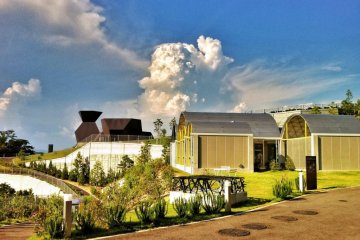 The Toyo Ito Museum of Architecture with summer cumulus
