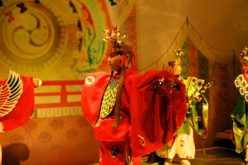 Models of traditional court dancers