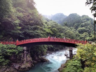 Shinkyo Bridge arcs over the Daiya River. When the founder of Nikko, Priest Shodo, first came to Nikko. It's said that a god helped him cross the rapids by intertwining two snakes together. The snakes turned into a bridge, which still stands today.