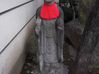 One of the statues at the gate
