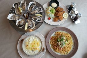 Clockwise from top left: Fresh Oysters, Fried Oysters, Oyster Pasta, Oyster Gratin