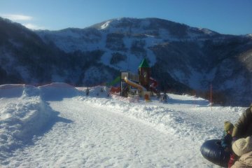 Sledding, tubing and snow play areas at the top and bottom of the resort.