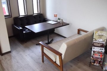 <p>Park yourself down and unwind at a corner table</p>