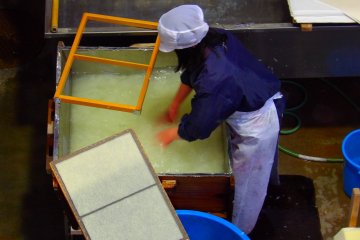 Paper pulp is sieved and moulded with icy cold water