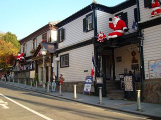 Santa Claus on rooftops in the historical district of Kitano Ijinkan