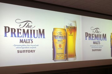 There is a big screen that shows the process of creating the beer