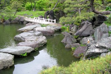 A pond and a stone bridge