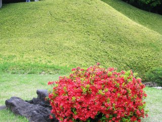Hills, stones, and flowers are also traditional elements of a Japanese garden